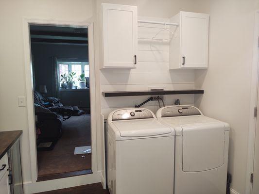 Garage to laundry room conversion with new entrance into house