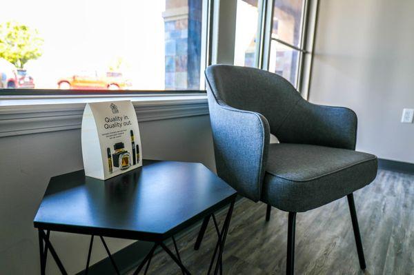 Comfortable chairs and informational materials in the waiting area