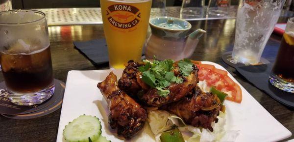 Ginger garlic wings and kona draft.