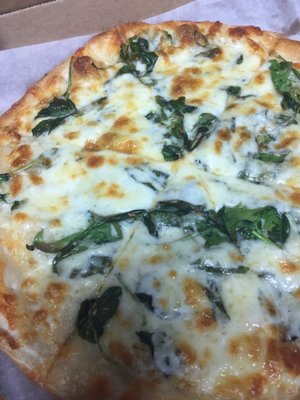 Small white spinach pizza