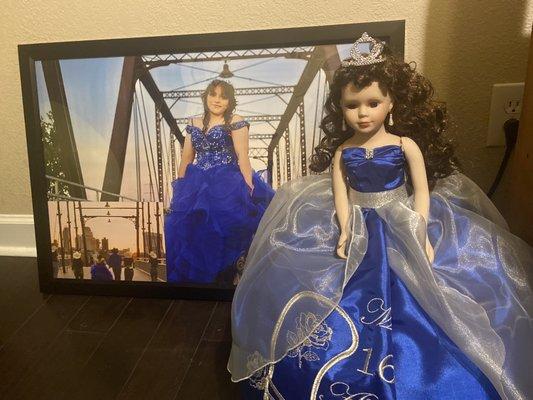 Picture of my daughter in dress.The doll is from Mandy's and so beautiful and made to fit the theme for sweet sixteen.