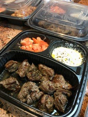 The Lamb Souvlaki Platter came with rice pilaf, a small tomato-and-onion salad and terrific tzatziki, a Greek yogurt sauce.