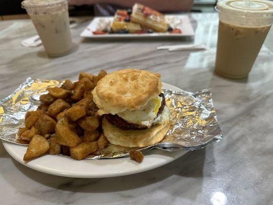 The sausage biscuit breakfast sandwich meal.