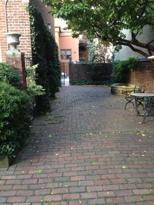 Patio connecting Latimer St to the gardens