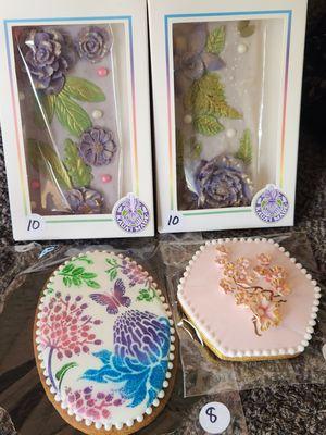 More than cakes - amazing decorated cookies, chocolate bars and more at a craft fair. Hand made flowers & air brushed stencil cookies