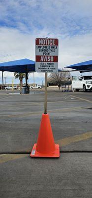 For the safety of staff and guests, please do not pass the cones. Vehicles move in multidirectional patterns.