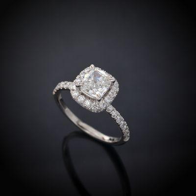 Custom made platinum Hidden Halo micro pave' engagement ring with 2.30 carat GIA Certified Cushion Cut Natural Diamond.