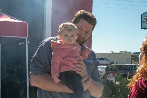 Owner, Brian Perry with his beautiful granddaughter.