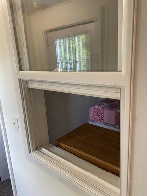 Random window from hallway at deck door into 2nd bedroom