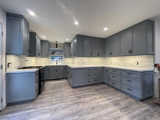 Kitchen cabinets and ceiling painted