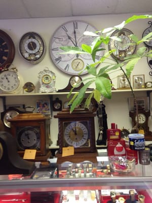 Lots of clocks and watches for sale.