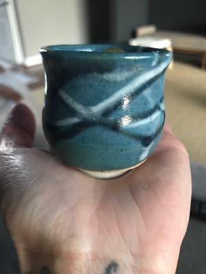 One of my Whitefish Pottery mini pots. I use it to hold my healing crystals and stones. Each one is unique.