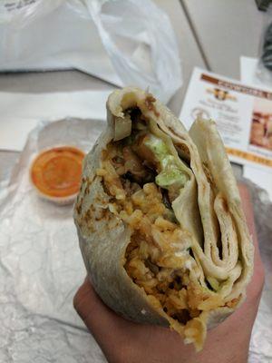 Inside of a super burrito with asada. Lots of rice but not bad.