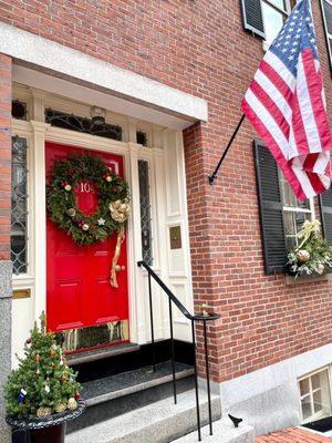 12/26/21 One of the iconic red doors on the brownstones that pepper this affluent and charming neighborhood.