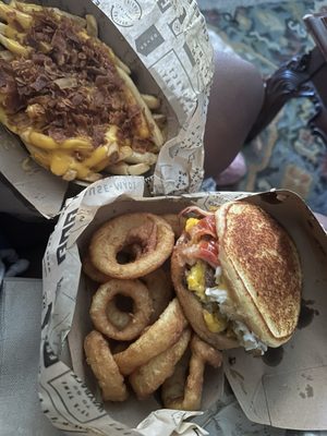 CHEEEESY BURGER ONION RINGS BACON CHEESE FRIES