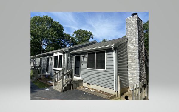 Home owner is ESTATIC, even the chimney is vinyl siding.