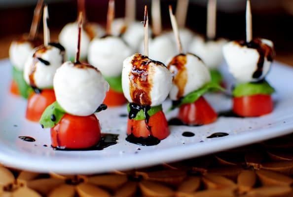 Caprese Salad in ONE BITE! Cherry Tomato, Fresh basil,  Fresh Mozzarella drizzled with a Balsamic Reduction