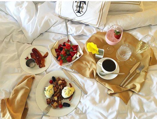 Breakfast in Bed with room service from MacArthur's Riverview Restaurant.