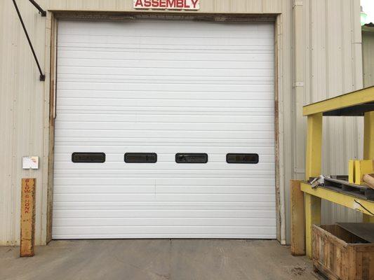 Commercial door at Orthman Manufacturing in Lexington