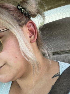 Helix, conch, and flat piercing.