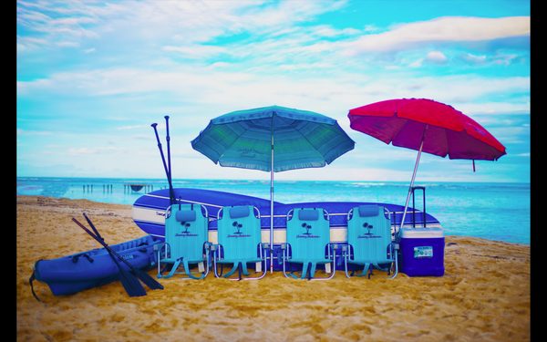 Oahu Beach Gear Rentals- Great Package for the whole family. 2 stand up paddle boards, double kayak, beach chairs, cooler and umbrellas.