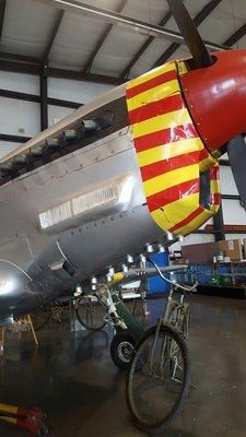 Replica P-51. Real exhaust underneath, extras on side...