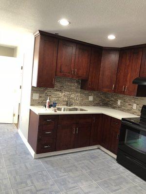 Finishing touches, back splash,grout and handles were the finishing touch for this amazing kitchen.