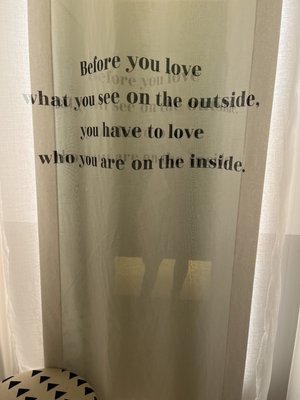 Curtain over the mirror in the fitting room.