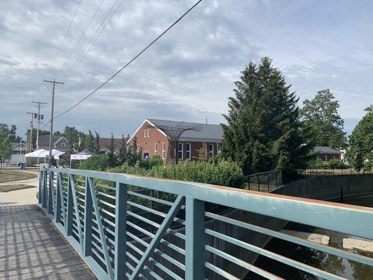 Crossing the bridge behind Wassenburg Art Center