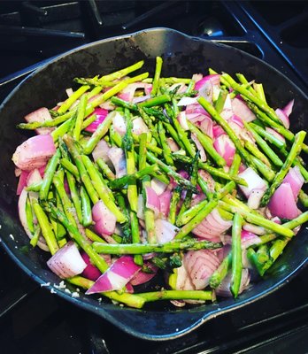 Eating healthy doesn't have to be difficult! Asparagus, red onion, garlic and a splash of evoo makes for a healthy and tasty side!