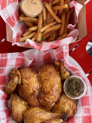 Whole roast chicken and truffle fries with Ají and lemon aioli dipping sauce.