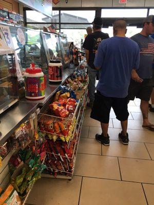 Notice our big gulps on the counter. They cost $10 dollars and cost only $1.36 to refill. The ice stays iced up for 8 hours at least