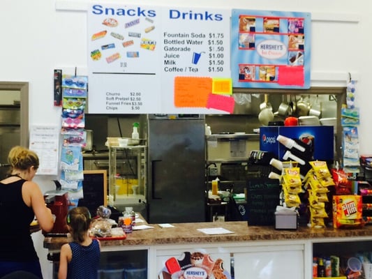 A view of the counter where orders are taken. This is where some of the smaller menu items are as well as their prices.