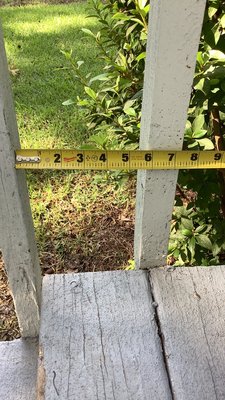 Measuring the space between the balusters for child safety