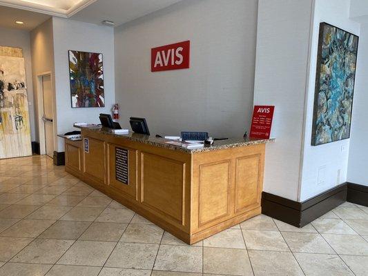 Avis Car Rental Counter located inside the Loews Hotel near the main Lobby next to the Concierge desk