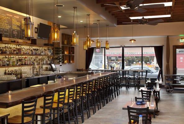 Walnut slab bar and redwood inlay tables at the amazing Southpaw BBQ at 18th and Mission in SF