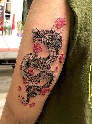 Japanese styled dragon with cherry blossoms