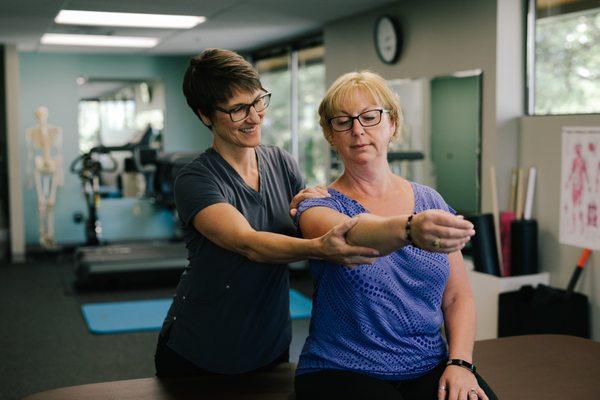 Dr. Annie correcting shoulder immobility and pain.