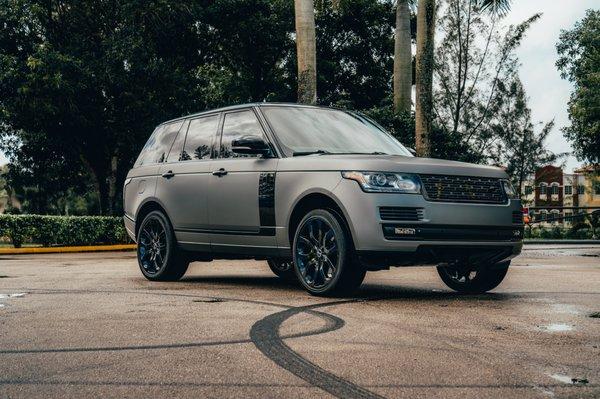 Range Rover received full customization with a full wrap yellow reflective calipers and new parts installed like grill and side vents.