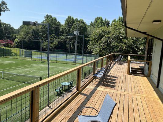 Pebble Creek Sports Club in Hickory. View from Clubhouse upper deck overlooking tennis and pickleball courts.