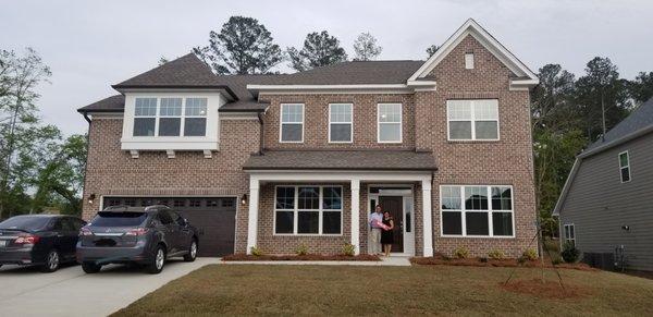 Mrs. Lalani and husband closing on their brand new home.