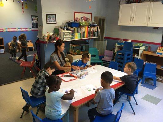 Our Prep class, 2-3 yr olds doing their daily work together with the guidance of their teacher