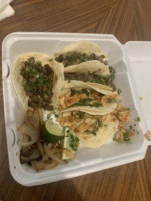 Chicken and Steak fajita flour tacos.