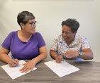 Su & Ene signing Loan docs....First time homebuyers