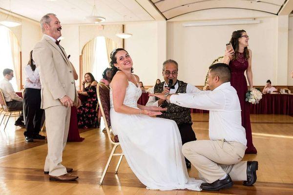 Doing the hand hover before the garter comes off.