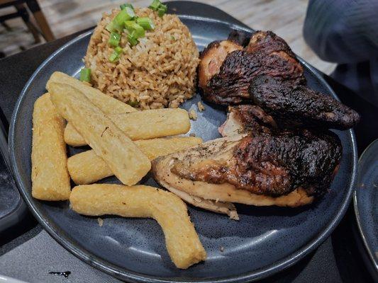 Half Chicken Our dilicious half chicken with Yuca Frita & Arroz Chaufa.