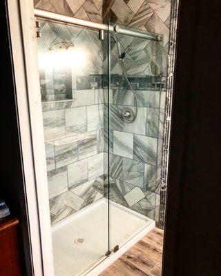 Hydro slide shower enclosure.