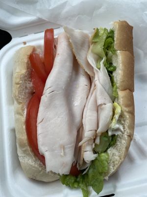 Turkey, lettuce, tomato, and mayonnaise