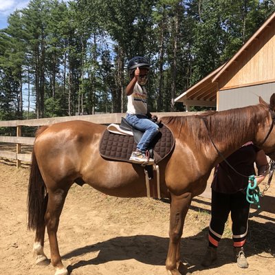 5-year old feeling calm and confident on Oscar the horse.