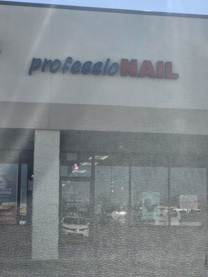 Front of nail salon, the inside is very disorganized even the stations are messy.